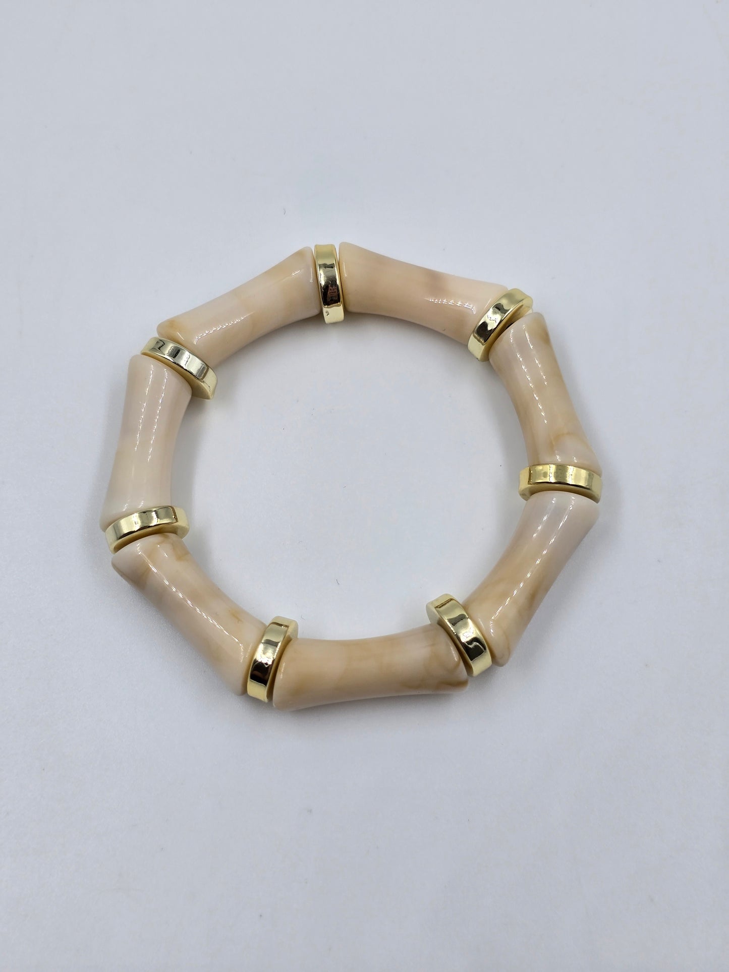 Beige bracelet with Gold Accents
