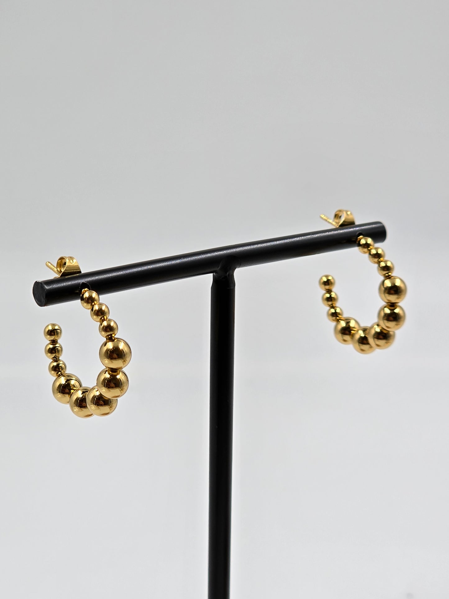 A - Golden Stud Earring