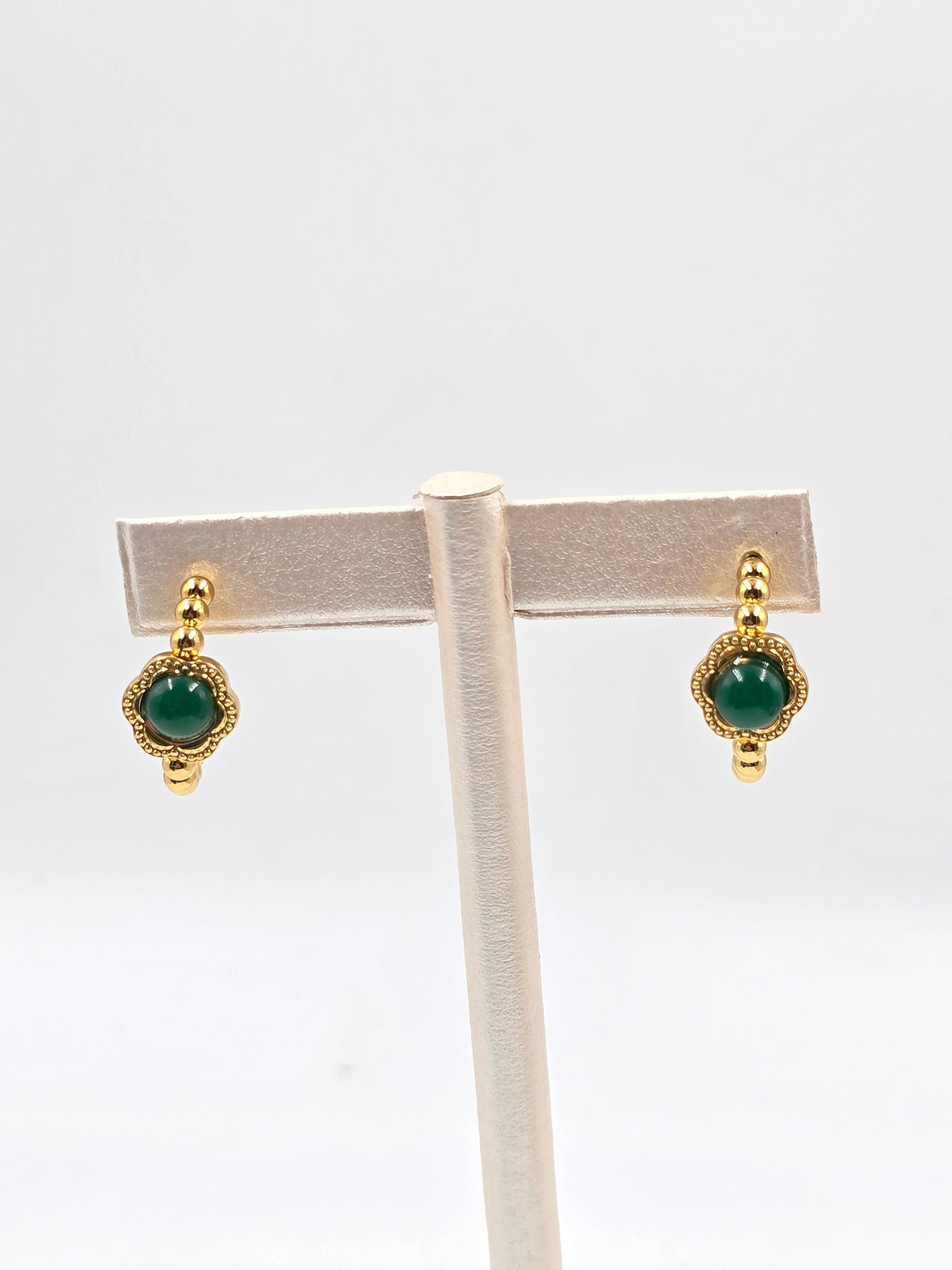 N - Gold earrings with gemstones