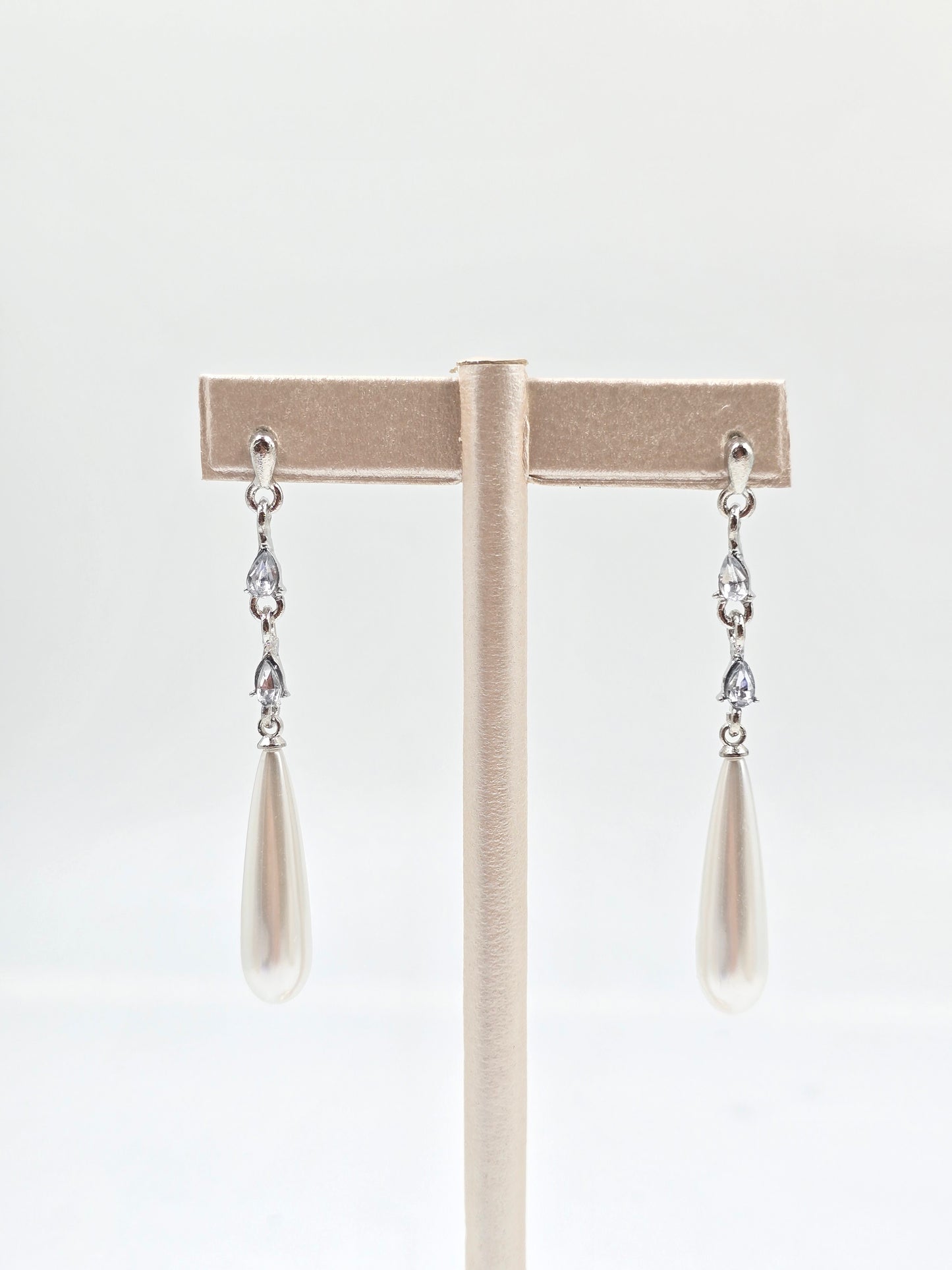 N - Silver and Teardrop-shaped Earrings