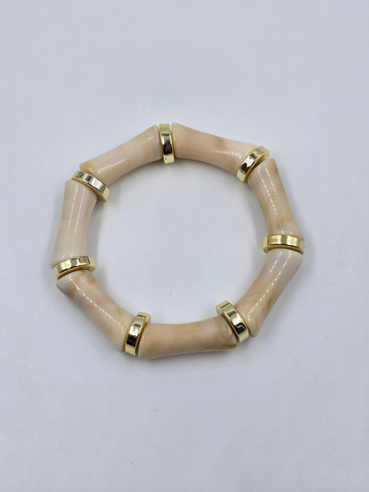 Beige bracelet with Gold Accents