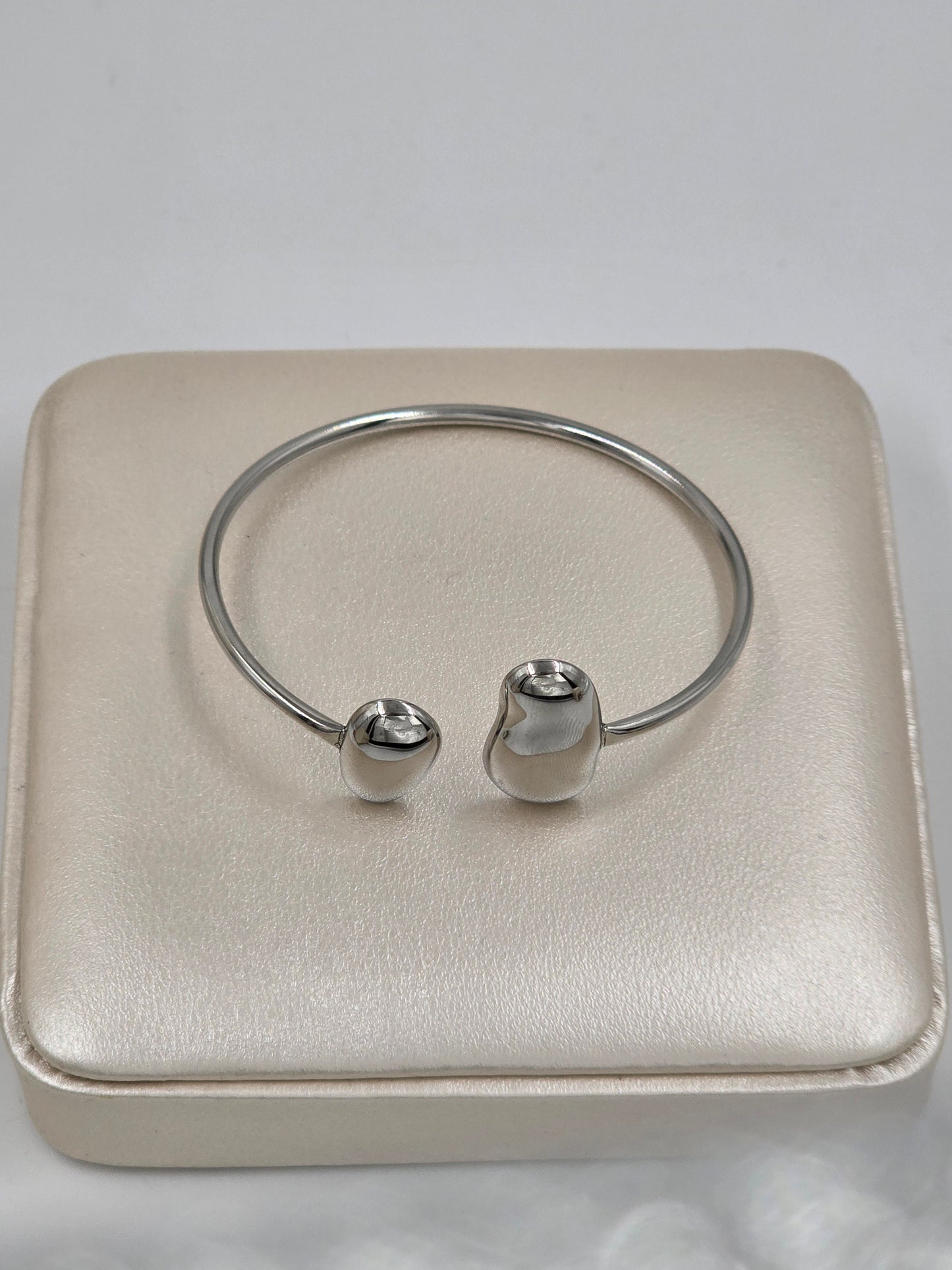 A - Bangles With Drops