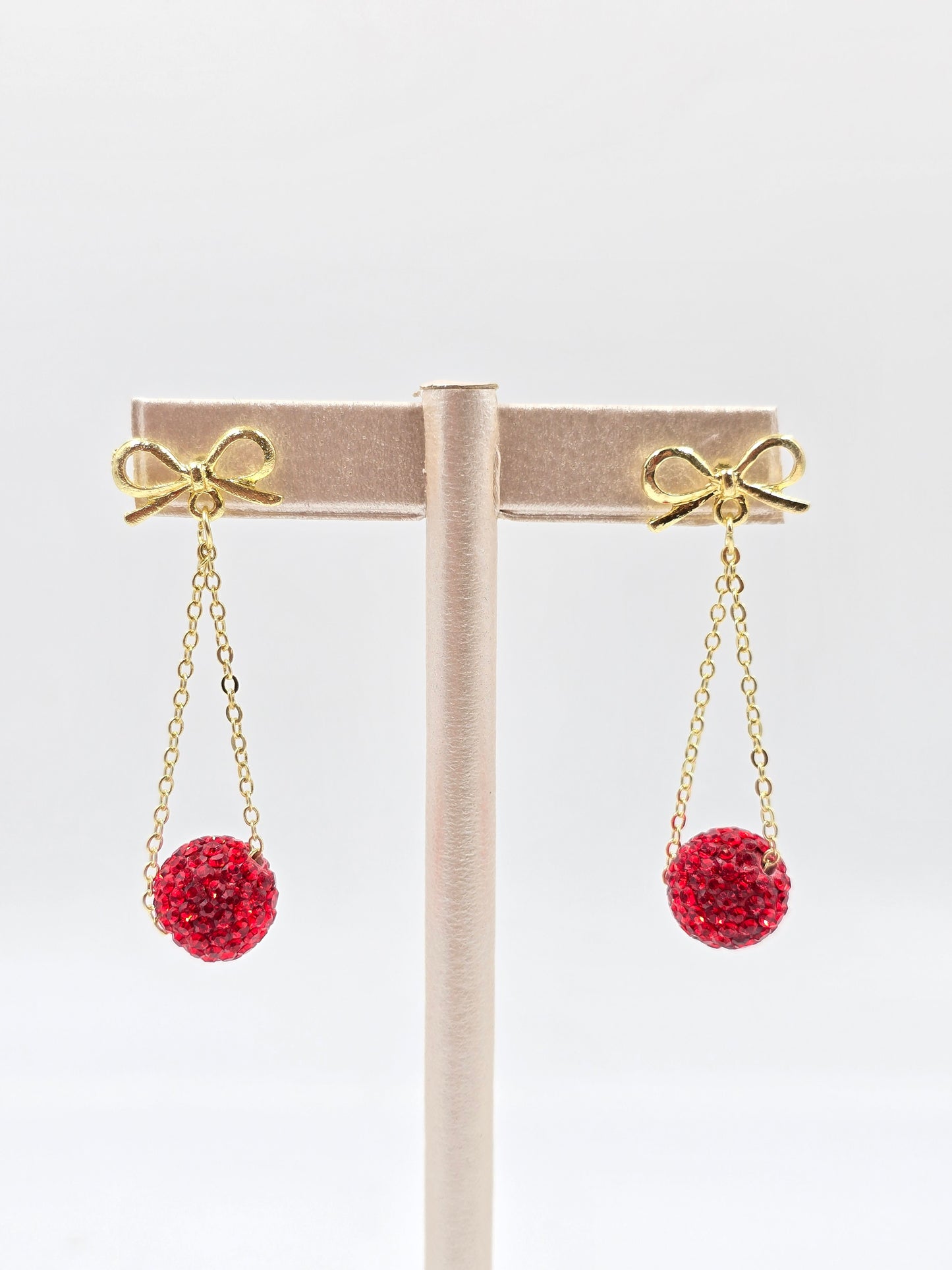 N - Bow with Red Gemstones Earring